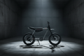 A black electric dirt bike with knobby tires, a short black seat, and a dark metallic frame, shown from a side profile on a white studio background.