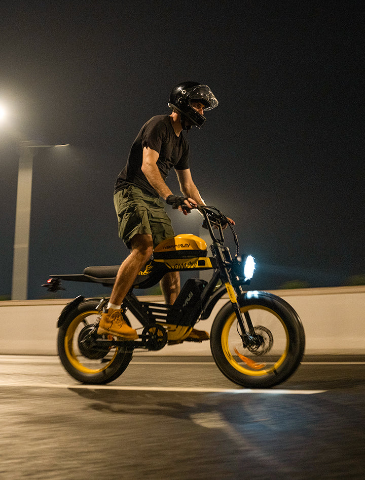 Street riding of Yellow HappyRun G100 Pro Dual battery Electric Cargo Bikes. Off-road, all terrain E-bikes with 72V 6000W motor system, fat-tire cruisers to sleek urban commuters. NFC unlock and LED Display, Hydraulic disc drakes, Full Suspension. HappyRun G100 e-bike is similar to Freego Flash F3 Pro Max Dual Motor 750W eBike 55Ah Battery 34 MPH, Voltvogue BK-20 Adult Electric Bike, Segway Xyber Electric Bike, Freego Flash F3 Pro Max Electric Bike, Cheetah MT-380 Dual-Motor Electric Motorbike.